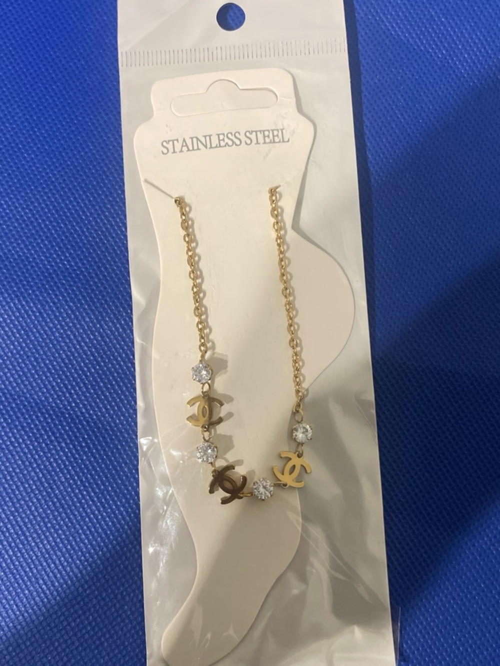 Gold-Tone Womenโs Anklets with Logo Charms and Crystals 10โ New